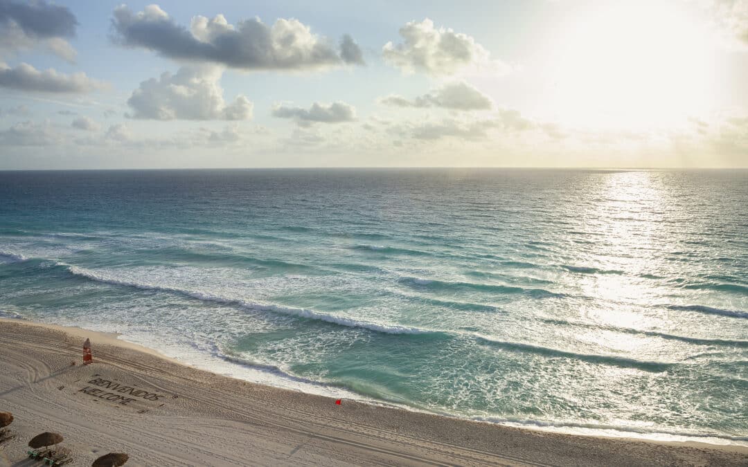High angle view of a sunrise over the ocean and beach in Cancun Mexico